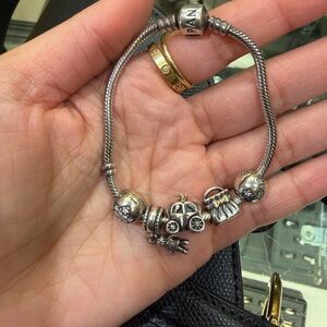 Pandora Silver Charm Bracelet with Carriage and Handbag Charms and other charms